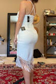 This dress fit even better than I thought it would! It's tighter in the waist and on my back side, but looser up top for a casual look. Thick enough fabric so that it's not see through, but still light weight! Good amount of stretch. - Emily S.