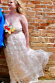 Fits good, it's definitely long though, I had it altered to use the extra fabric as a small train, first dress I ordered the strap snapped off but customer service was great quickly sent me another dress. - Kaitlynn C.