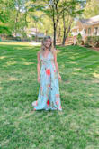 I'm obsessed with this dress! I'm usually a medium but ordered and a small and it fit perfectly. It is a little long if you wear flats but I didn't mind. - Kacey B.