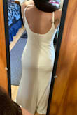 I needed to find a dress for our elopement ceremony and this was perfect! The material is thick and high quality. The adjustable straps were so helpful (as I'm not very busty and have an hour glass figure - wide hips!).
While the size Small did fit, I have endometriosis and deal with excessive bloating (endo belly) and I personally don't like things fitting too tight on my lower abdomen/pelvic area and that's why I ultimately chose to wear the Medium. I thought it fit perfectly/comfortably honestly.
After reading reviews, I agree - getting a strapless bra and Spanx (to smooth things out if desired) would be helpful! I didn't wear Spanx, but I did get one of those adhesive bras and that was a great decision!
I love this dress so much, I may actually wear it to our vow renewals/reception with friends and family! - Sara T.