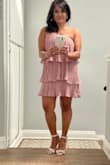 This was perfect for an evening wedding by the beach. I ordered a small dress which I am glad I did as there was plenty of room in the bust area,  I usually would go medium due to this. So this dress doesn't really run large but I guess if you are thinking of getting a larger size than what you normally wear, don't. I received a lot of compliments and the shoulder was perfect for this springtime event. I did pin the dress up just a tad to make it a little shorter but that's because I'm only 5'2". I did wear a strapless bra but it isn't see-through so you can probably get away without one. This dress was made very well, it fit great and for the price it was definitely a steal! Also, I bought this same dress in navy blue for another wedding in October. :) Very happy with this purchase!! - GUINEVERE M.