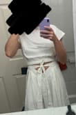 This dress is very cute but it's huge! I wear a medium in most things... The skirt part is heavy and literally falls down even when tied tight. I love it though so I'm going to exchange for a smaller size and hope for the best! - Grayson G.