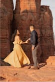 Loved the color, loved the style! Wish the button was more secure, and it is way too long for me, even with 4 inch heels, so I had to hem it. Wore it for my engagement photos and received so many compliments for it! - Edel S.