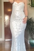 Absolutely love this dress! Fits very well and is even the perfect length before tailoring. Fabric feels very high quality. - Lydia C.
