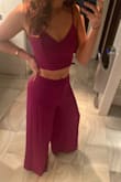 This cute set is to die for, I received so many compliments on the lovely purple color - it is very comfy to sit in and to walk around in. Imagine fancy but comfy PJs. No one will know you're both cute and comfy at the same time. The back of the top is amazing for fit! The tie makes it very easy to fit to you - it opens up the garment pretty far and helps sit it in a way that isn't too tight! The pants let your leg sneak out and peek a boo perfect! Amazing purchase! - Ashli Z.