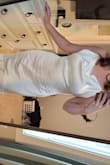 I started having doubts about my original wedding dress so I ordered this and a few others from Lulus. The material is beautiful - it has a nice weight and flow to it. I was worried that satin would show every bump and imperfection, but the dress is very flattering! I ADORE the back. If I keep it, I will probably need to have it altered, as the straps are a little short and it sits funny around my bust. I would also have the hips taken in slightly. Overall, great dress! - Shaelyn W.
