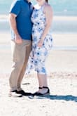 Wore for beach engagement photos. I didn't want an only white dress so the blue flowers were a perfect touch. Photographed nicely and flowed well in the wind. - Rachel W.