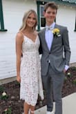 I wore this dress to Prom and got a lot of compliments. It was classy but also different and very beautiful. It fits tight through the rib cage. I had to go up a size to a medium just to get the zipper up. - Brooke L.