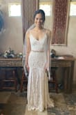 I didn't love it when I first tried it on, and didn't find it flattering. I took it to get altered and ended up being super happy with how it turned out. I def recommend getting the dress altered. - Megan S.