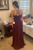 I was super happy with this dress for an upcoming wedding. It is true to size but is a tad long even in an XS. The dress is really comfy and straps are adjustable (yay!). - Charlene R.