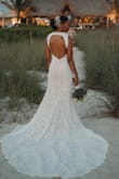 This dress was perfect for my beach wedding. True to size, didn't need any alterations at all. - Karlene M.