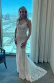 The dress was absolutely stunning! It fit perfectly on my wedding since I ordered a dress online without even trying it on first! Reading all the reviews helped picking the right size for me! I paired the dress with a beaded belt! It was perfect for my Vegas wedding! - Shawna S.