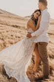 The dress was perfect! I used this dress for my engagement photos. I have more of a square upper body but the dress helped it look less since it flared on the bottom. The straps are not adjustable. - LeeJin N.