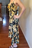 This is a pretty dress but it runs a bit large. I don't think it's the best of you have a small chest. I tried to use the chat feature for sizing, but was put on hold for a very long time. They followed up with me via email, but at that point it was too late. - Allie N.