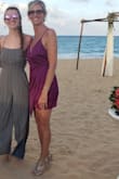 Material very nice, shipping of product timely. I have a small chest, but with a bra it was fine. Definitely enough room in chest for larger breasted women. Felt a bit short for me, but the asymmetrical fabric in front helped. I just was conscious of the back and was careful when bending. I wore for a beach wedding. Great fabric, and comfortable. - Kelly L.