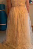 This is a very pretty dress. The extra layer of tulle is just too much for my already heavy-set frame. It looks very bridal...very pretty. Going with another Lulus dress. - Valerie D.