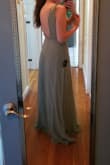I don't normally write reviews, but figured I'd help entice some other lucky gal to buy this dress...because it's wonderful! It's comfortable, beautiful, sexy, and quite possible be the best dress I've ever worn. I normally wear a size S, but sized down due to its loose look and it fits me perfectly. However, the length is a little long for me. The color is a bit more mint green. Can't wait to wear it to a friend's wedding. - Paige H.