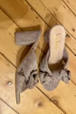 These sandals are more of a pink/ yellow shimmer (Taro) than the pictures make it seem.
Also- the glitter gets everywhere! It's all over my feet, floor, jeans...
The size is true to size - the fabric band is stretchy and comfortable - Dora M.