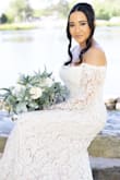 The dress was beautiful. While I was taking pictures everybody couldn't believe I just got it for $100. Didn't have time to do alterations but it fit quite well. Worked great for the elopement and also came out lovely in photos. - Gianna T.