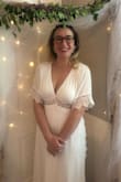 Based on my measurements (38, 31, 41), the size chart told me I'm a large, but everything that I ordered in large was pretty loose, this included. Even at a medium though, I had to wear at least a 1" heel to keep it off the ground (I'm actually 5' 5.5"). Aside from allllll of that about sizing, it was so soft and comfortable for HOURS, and just the perfect dress for our tiny little wedding vibe. The lace edging is so elegant. - Cassaundra K.