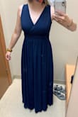 I love this dress! I did have to have it hemmed and I also got the straps taken up a bit because it was looking a little saggy around the breast area. With the alterations the dress fits me perfectly and I don't have to worry about my boobs/bra showing. The slit isn't noticeable unless you want it to be, which I love. - Kayla R.