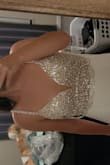 It's very comfortable and I love the detailed beading. I'm short so I have to get it hemmed and the straps taken in. Other than that, it's perfect! - Demi S.