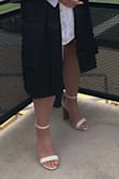 I normally fluctuate between a size 6.5 or 7. After reading the other reviews, I decided to size down and get the 6.5 which fit PERFECTLY! I would say that if you are between sizes, I would recommend you size down. I got the color Taylor White Stacked and it is absolutely gorgeous and neutral to wear with anything! Loved the "wooden" heel instead of the "all white" look. - Kelly T.