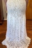 I got this dress for my summer 2021 wedding. I already have my first dress but I wanted a second one in case the other was too heavy and hot for a July wedding. I bought the Flynn White Lace Maxi Dress in size XL and 1XL. I ultimately went with the 1XL. I noticed with the 1XL the pleats on my thighs wouldn't open. With the XL it's almost as the pleated part by my thighs were being stretched opened a little and I didn't like that I preferred a cleaner/a little looser look. This dress makes you feel like a princess and it's extremely comfortable and easy to move in. Due to the fact I'm very short I'm getting the front hemmed and adding buttons to the back of the dress where the zipper is that I found on Amazon for like $10. I also don't mind the adjustable straps on my shoulders if anything I prefer them like that so you can adjust it to what's comfortable to you. Do NOT hesitate and buy the dress trust me! If you have big hips and thighs I recommend you size up 1 size if not go with your regular size. Enjoy! - Jessica P.