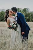 I was 26 weeks pregnant when I wore this for our backyard wedding, and it was PERFECT. I'm normally a medium but ordered a large because I'm tall and to fit the bump, but had to take it in and should have ordered a medium. I'm normally always nervous about length because I'm 6ft, but the length was perfect. There was so much room for the bump! I could probably wear it up to term. If you're expecting, order your pre pregnant size!! I have only good things to say about this dress! - Jessica S.