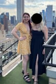I LOVE THIS DRESS! It looks amazing and I love the confidence the deep-V gives me. I wore it with breast tape and double-sided clothing tape so everything stayed in place for an entire day of walking around the city. It would be a bit risky to wear without the double-sided tape for me. The stitching at the ends of the sleeves is a bit tight on my arms, but I wouldn't size up. - Emily R.