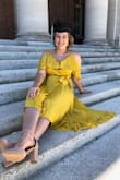 I bought this dress for my master's graduation from Vanderbilt University to match the school color and it was perfect!! I got so many compliments, it was breezy and gorgeous and I felt beautiful and fierce! The button in the front sometimes pops open, but the dress can be tied and pinned so that's no problem! I will be wearing this dress for a wedding this summer! Love Lulu's and would buy from them again! - Marian K.