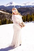 This was the perfect dress for my snowboarding wedding. Yes, I got married in it and then snowboarded down the mountain.  I am short so I needed it hemmed and my seamstress was able to take it up at the drop waist and keep the bottom edge and pleating the way it was designed. She also added a wrist strap which was perfect for the train. I had first tried the XL, as I have never had to order a 1X before, and while it fit ok, it was really tight and I felt a little sausage like. I quickly ordered the next size up and sausage effect was gone. I did wear shapewear under it which helped control my curves a little.
Pros: You can wear a normal bra with this! The material is super comfy and low maintenance, you don't need to worry about it wrinkling or last minute steaming or pressing. The stretchiness made it so comfy. So many compliments on my dress and people are shocked when I brag about how little I spent. I could snowboard in it, so I am sure you can dance 
Cons: I had to remind myself to ignore the size tag. - Amy W.