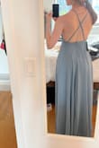 Extremely flattering, loose material that still creates a nice silhouette. The back is just perfect! Long enough for me (5'8") to wear 2-3" heels. - Lauren I.