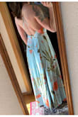 I think this dress is beautiful and worth the money. Be aware if you're short like me you'll definitely need to get it altered. I needed to have it brought in around my chest and at the bottom. It's made for people with longer torsos (not me) so it was an adjustment wearing it so low. It's for a wedding so I don't mind spending the extra money for alterations. Also its a LOT of fabric so be prepared for that. Other than that, I love it. - JAMIE R.