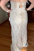 I loved this dress but unfortunately it was just a little bit too small and XL was the largest size it comes in. The lack of symmetry in the back also bothered me a bit, but I probably would have tried to overlook that if it had fit. - Tiffaney K.