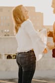 Wore this too for my engagement photos and I am so in love with it! The flowy arms and off the shoulder top are exactly the vibes I was going for. - Liz H.