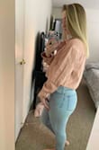 When I first tried this on, I hated it. It was too boxy for me and I was going to return it. However, if you style it right, it's actually really cute.  The fit is still boxy and large, so I would order a size down for sure.  I wish it was a little tighter around my waist and also wish the color looked more like the picture.  In the model photos it seemed like a light pink but in person, it's closer to a salmon color.  Overall, it's a cute jacket and I've decided to hang on to it. - Carissa W.