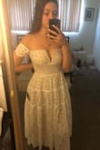 I was so excited when this dress came back in stock and ordered that day! When it came I put it on right away and loved it, it was exactly what I wanted.. BUT the other reviews are right, it is big and I am definitely going to need to get it taken in/altered. I almost ordered a S actually but decided to size down and thank gosh I did because it runs big. Excuse me awkwardly holding the back of the dress in the photos, otherwise it looks too big. The zipper also keeps getting stuck but that happens with all Lulus dress. It's a beautiful dress and great material that I'm super excited to wear but definitely size down is the most important thing - Bri A.