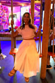 I first ordered a small but returned for an XS. I love this outfit. The skirt does have a lot of material but it's comfortable and super cute. - Karen C.