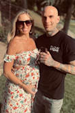 The dress fit like a dream! I wore it at 33 weeks pregnant, and didn't need a bra or belly band. I got so many compliments at my baby shower. I can even wear it after pregnancy - Courtney S.