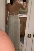 I don't think I'd even have to alter this dress - it fits so perfectly. When I wear the dress, I feel light and airy and free. The lace feels modern and I love the open back for a summer wedding. - Laura S.