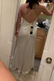 I LOVE the back and side profile of this dress. Unfortunately, the cowl neck just fits my chest awkwardly. The shiny satin is beautiful however. It may fit others differently, but the (non-adjustable) straps were maybe just too short for my small chest and broad shoulders. - Laura S.