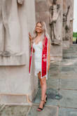 I absolutely love this dress! It's saucy but still modest, and perfect for taller girls like me! It doesn't really have any stretch to it, so I would size up if you're on the fence. - Emily P.