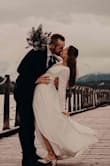 Bought this dress 2.5 weeks before my elopement. Loved the neckline and slit. The top of the dress ran slightly large for me, but I wouldn't size down. The dress looked lovely in our photos! Highly recommend. Can't beat the price! - Brielle K.