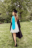 This dress was perfect for my grad photos!! (Bought white, size S) It was a little lower cut than I was expecting, so I couldn't wear a bra, but it's still so cute. The fabric is thick with another lining underneath. I wore black underwear and you couldn't tell! The back was adorable and a bit sexy. I will definitely be wearing it again! (I also have this in black in an XS, and while the XS fit, the S fits much much better and is not as tight around the back) - Emily C.