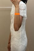 I bought this white dress in an extra small for graduation. It's cute, modest, but a little basic. Being a thin girl, it's a little unflattering because it's loose and shapeless up top. It does hug my butt somewhat, which I like. Overall, good quality. I'm keeping it and wearing it for graduation because I'm gonna be wearing a cap and gown over it anyways. - Anisha A.
