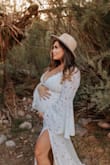 This dress was a dream come true, after sending multiple dresses back, I'm so happy I found this one! It was picture perfect, I was 33 weeks pregnant and sized up (XL) to fit the belly and boobs and it worked flawlessly!! - Cayley M.