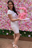 Can't begin to describe how much I love this dress. I wore it for my bridal shower and it couldn't have been more perfect. The beading was exquisite and so detailed, looked amazing and I got so many compliments! Really great quality. Felt like I was in a designer dress! Only downside is that it runs small, I would have gotten a small but it was out of stock, the dress has no give. Still completely worth it!! If you're thinking about buying it for your bridal event don't hesitate!! - Maria B.