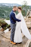 A couple of months before I was supposed to get married, my ceremony venue informed me I wouldn't be able to get married there. So we decided to elope to Colorado. My original spaghetti strap dress wouldn't work for the cold mountain weather, so Farida to the rescue! I had to wear a nude slip thing underneath, but other than that, I only had to have it shortened, since I wore hiking boots! - Nicole S.