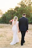 This dress was everything I imagined and more!! I wore wedges to help with the length but I didn't hem it because I liked that it gave it a train like look. I also sewed bra cups in like some others which helped a lot. I love love loved this dress and the pics speak for themselves!! - Emily B.